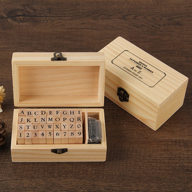 Wooden Alphabet Symbols Stamp Set.