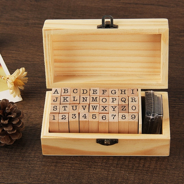 Wooden Alphabet Symbols Stamp Set.