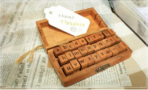 Wooden Alphabet Symbols Stamp Set.