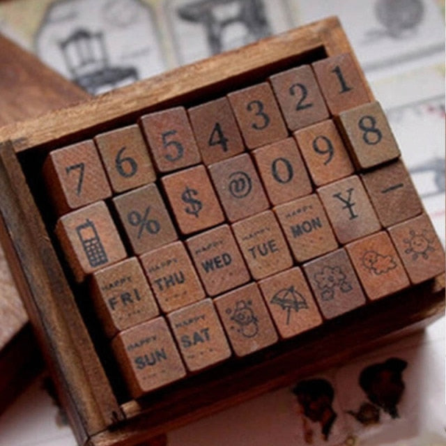 Wooden Alphabet Symbols Stamp Set.